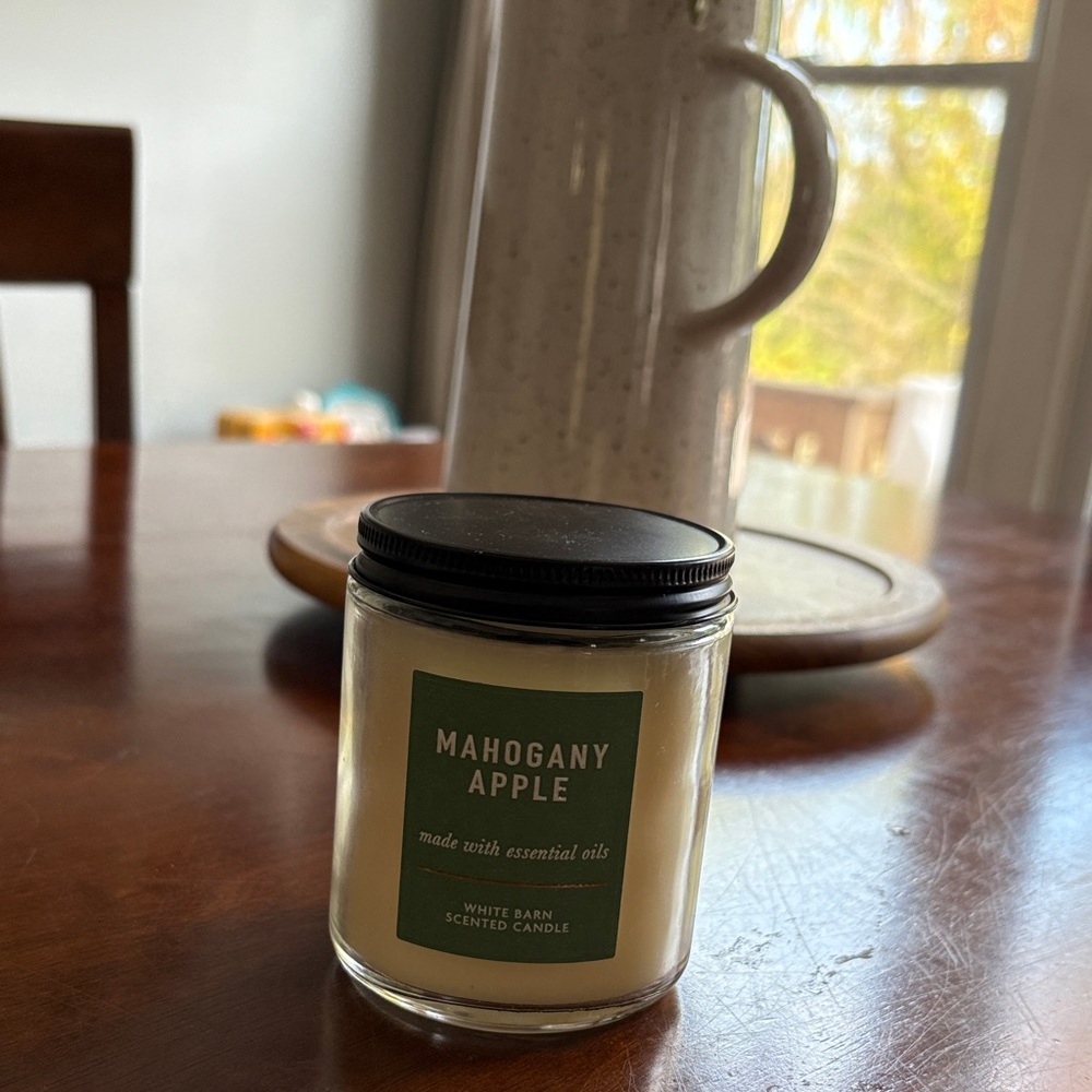 White Barn Mahogany Apple Candle with Black Lid and Green Label
